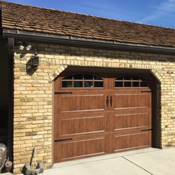 Advanced Garage Door Service - 9x7 clopay gallery  model GD2LU  Ultra Grain Dark Oak Ranch Panel  Windows: Arch2 with grills