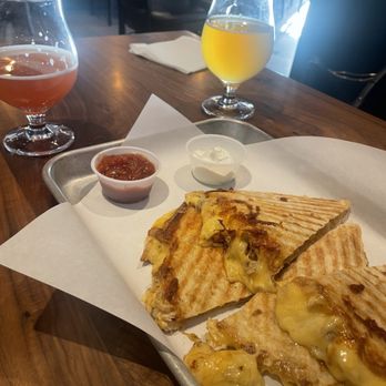 Tap2 - A cheesy chicken quesadilla. All the sour beer #12 &13 was tapped out; only enough for about 1/2 a glass. The other drink was #9. - Bars Near Me - Avondale, Arizona