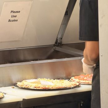 Round Table Pizza - Receipt trash layed on pizza! Cross contamination at its finest - Pizza Near Me - Santa Paula, California Round Table Pizza - Receipt trash layed on pizza! Cross contamination at its finest - Pizza Near Me - Santa Paula, California