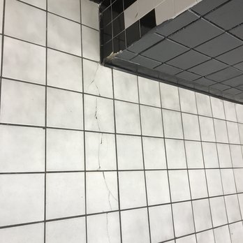 AMC Raceway 10 - Cracked floors, broken tiles in bathroom! - Cinema Near Me - Westbury, New York