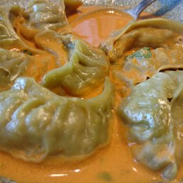 Veg Jhol Momos (dumplings filled with kale, butternut squash, mushrooms, and spices, served in a cashew/peanut sauce - vegan, $17) Veg Jhol Momos (dumplings filled with kale, butternut squash, mushrooms, and spices, served in a cashew/peanut sauce - vegan, $17)