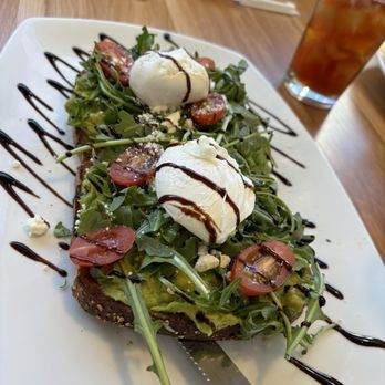 Broken Yolk Cafe - Feta Avocado Toast w/Egg - American Near Me - Phoenix, Arizona Broken Yolk Cafe - Feta Avocado Toast w/Egg - American Near Me - Phoenix, Arizona