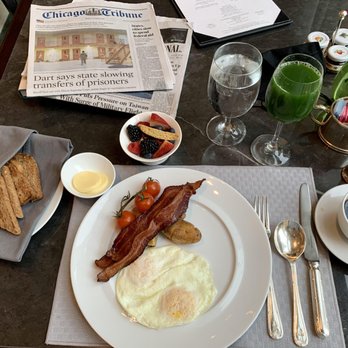 The Lobby - The Peninsula Breakfast ($38). Includes coffee, toast, two eggs, meat, tomatoes, yogurt with berries, toast, and juice. - American Near Me - Chicago, Illinois The Lobby - The Peninsula Breakfast ($38). Includes coffee, toast, two eggs, meat, tomatoes, yogurt with berries, toast, and juice. - American Near Me - Chicago, Illinois