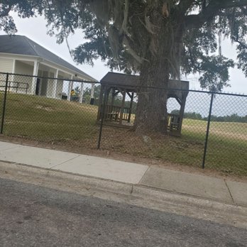 Greyhound Bus Lines - Sitting area inside closed gate. Homeless people sleep here - Public Transportation Near Me - Albany, Georgia