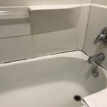The Yosemite Inn - So disgusting! Wouldn't even step into that shower! It's dirty and looks like mold all over! - Hotels Near Me - Mariposa, California