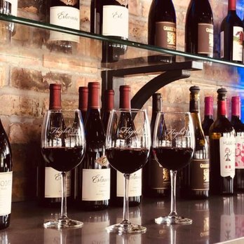Flight 22 Wine Bar - a row of wine glasses and bottles - Wine Bars Near Me - Berwyn, Illinois