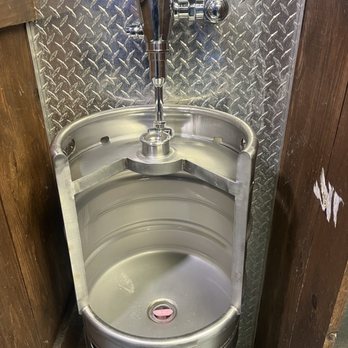 McLean's Pub - The gentleman's toilets are beer kegs - it's the circle of life. - Pubs Near Me - Montreal, Quebec