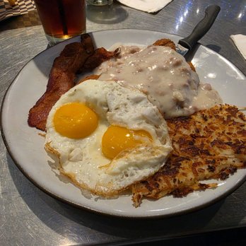 Dawson's Bar & Grill - Chicken Fried Steak with sausage gravy, sunny-side eggs, and hashbrown. Bacon included! - Bars Near Me - Dixon, California Dawson's Bar & Grill - Chicken Fried Steak with sausage gravy, sunny-side eggs, and hashbrown. Bacon included! - Bars Near Me - Dixon, California