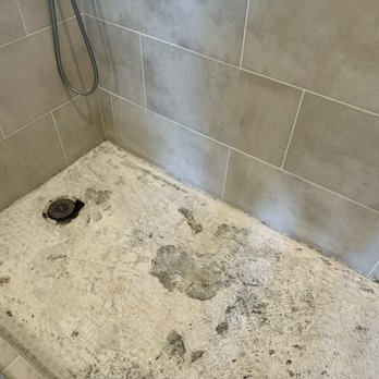 The Grout Medic of North Chicago, IL - Cement subfloor where old tile was installed incorrectly - Tiling Near Me - Chicago, Illinois