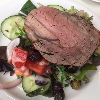 Horizons Modern Kitchen + Wine Bar - Prime rib over a combo of tomato-cucumber salad and fresh greens - Breakfast & Brunch Near Me - Fairport, New York