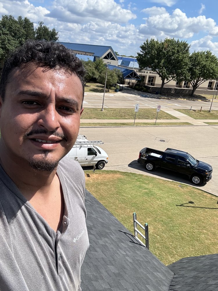 Slide of Quantum Roofing and Construction