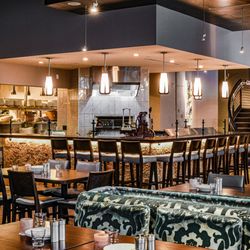 Pinstripes - Watch the magic happen--dining with a front-row view of our pizza oven.