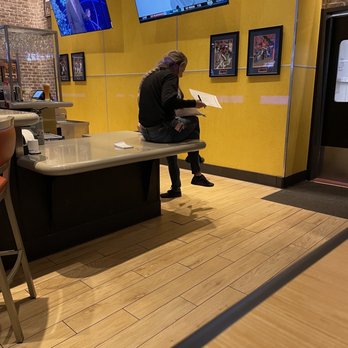 Buffalo Wild Wings - Two managers sitting on the counter while there's people who have been waiting for over ten minutes to get seated. - Chicken Wings Near Me - Sheridan, Colorado Buffalo Wild Wings - Two managers sitting on the counter while there's people who have been waiting for over ten minutes to get seated. - Chicken Wings Near Me - Sheridan, Colorado