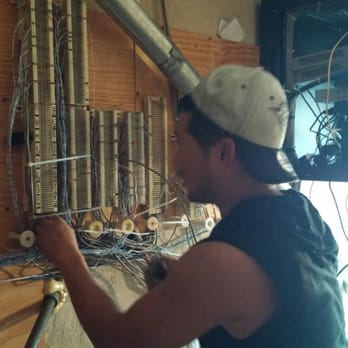 Dream Telecom Solutions, Inc. - Johnny working hard and organizing the mess left behind from previous service provider. - Telecommunications Near Me Dream Telecom Solutions, Inc. - Johnny working hard and organizing the mess left behind from previous service provider. - Telecommunications Near Me