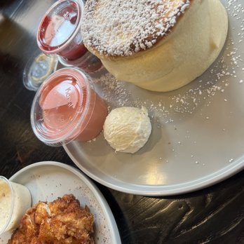 Burnt Crumbs - Soufflé pancakes with side of spicy chicken (half eaten portion lol) - New American Near Me - Irvine, California Burnt Crumbs - Soufflé pancakes with side of spicy chicken (half eaten portion lol) - New American Near Me - Irvine, California