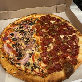 Little Coyote - Half veggie and half meat lovers.  Meat side was all meats and still was not oily or greasy - Pizza Near Me - Long Beach, California