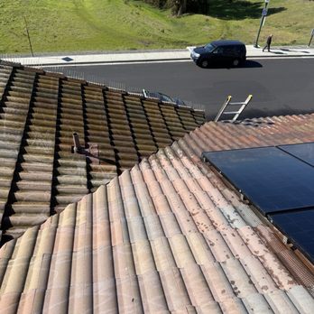 Spotless Cleaning Services - Roof after cleaning - Pressure Washers Near Me