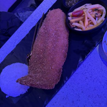 Isaan Der - Thai Kitchen & Bar - Deep-fried fish fillet with mango salad (basa fish) - Thai Near Me - Richmond Hill, Ontario Isaan Der - Thai Kitchen & Bar - Deep-fried fish fillet with mango salad (basa fish) - Thai Near Me - Richmond Hill, Ontario