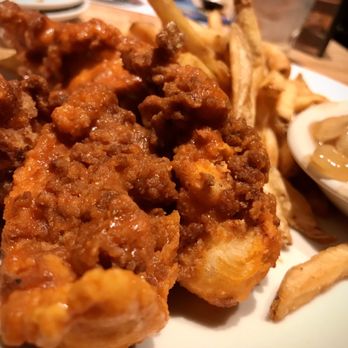 Cotton Patch Cafe - Chicken Tenders with buffalo sauce, fries and cinnamon apples. - American Near Me - Burleson, Texas Cotton Patch Cafe - Chicken Tenders with buffalo sauce, fries and cinnamon apples. - American Near Me - Burleson, Texas