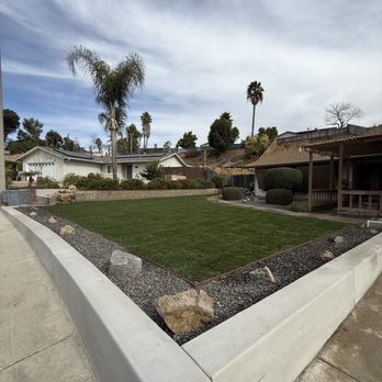 Sierra Landscape - New Concrete Wall with Sod - Landscaping Near Me Sierra Landscape - New Concrete Wall with Sod - Landscaping Near Me