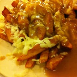 Irving TCH - Large poutine! Great road stop food.
