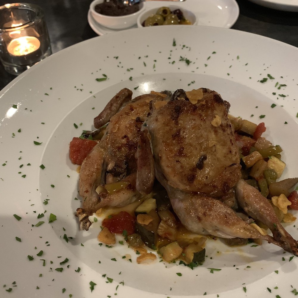 Costa Brava Bistro - Semi-boneless texas quail filled with wild mushrooms and jamon serrano. - Spanish Near Me - Bellaire, Texas