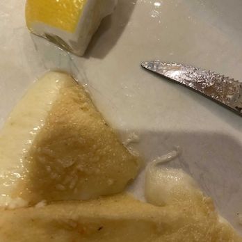 Antik Greek Kitchen - Saganaki (delicious Greek cheese with lemon) - Greek Near Me - Fairfield, New Jersey Antik Greek Kitchen - Saganaki (delicious Greek cheese with lemon) - Greek Near Me - Fairfield, New Jersey