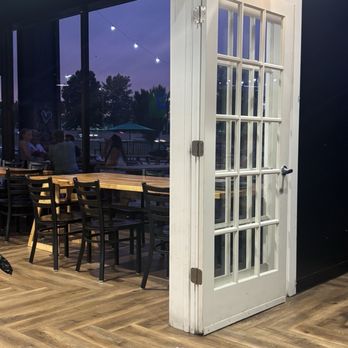 The Modern Brewery - Seating and windows to patio - Breweries Near Me - Saint Louis, Missouri