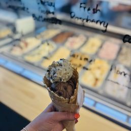 Single scoop spilt flavors in a waffle cone Single scoop spilt flavors in a waffle cone