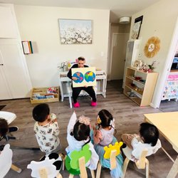 Fun Learning Montessori Daycare - Teacher Leslie teaching about geography