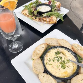 4 Sisters Wine Bar and Tapas - Creamy bacon and Gouda dip, Oaxaca Braised Chicken Quesadilla - Wine Bars Near Me - La Crosse, Wisconsin 4 Sisters Wine Bar and Tapas - Creamy bacon and Gouda dip, Oaxaca Braised Chicken Quesadilla - Wine Bars Near Me - La Crosse, Wisconsin