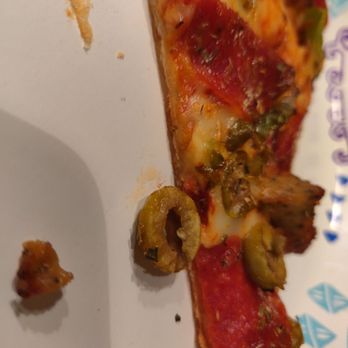 Dominos Pizza - a slice of pizza on a plate - Pizza Near Me - Grand Blanc, Michigan