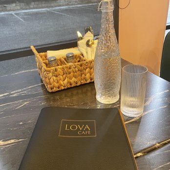 Lova Cafe - Water bottle at table - Breakfast & Brunch Near Me - San Antonio, Texas Lova Cafe - Water bottle at table - Breakfast & Brunch Near Me - San Antonio, Texas