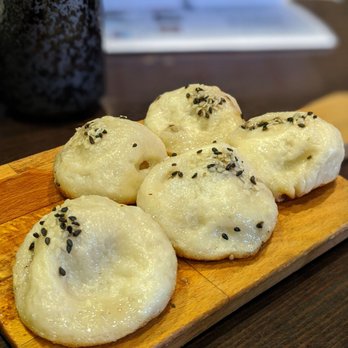 Tasty Moment - Pan fried pork juicy bun (comes as 6 pieces but I already ate 1) - Shanghainese Near Me - Edison, New Jersey Tasty Moment - Pan fried pork juicy bun (comes as 6 pieces but I already ate 1) - Shanghainese Near Me - Edison, New Jersey