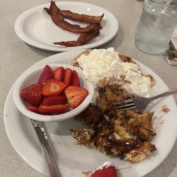 Nancy's Cafe - Chocolate chip pancakes with whip cream, strawberries, and bacon! Seriously, the best pancakes ever! - Breakfast & Brunch Near Me - Auburn, California Nancy's Cafe - Chocolate chip pancakes with whip cream, strawberries, and bacon! Seriously, the best pancakes ever! - Breakfast & Brunch Near Me - Auburn, California