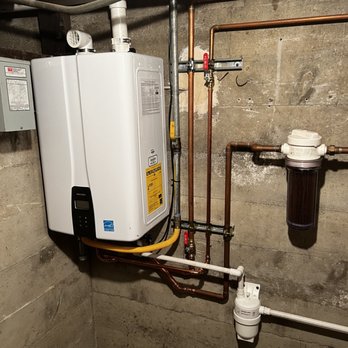 1 Backflow Plumbing - Navien tankless water heater with built-in recirculation pump. - Water Heater Installation/Repair Near Me 1 Backflow Plumbing - Navien tankless water heater with built-in recirculation pump. - Water Heater Installation/Repair Near Me