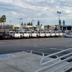 John L Sullivan Chevrolet - Sea of Farmer White Pickups