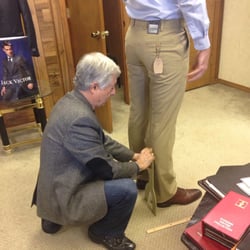 John measuring my fiancé's khakis to be hemmed. $15