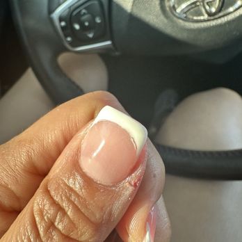French Nails & Lashes - The white tip so thick has no shape and he couldn't clean up the line from the shaping he was doing with the acetone - Waxing Near Me - Murrieta, California