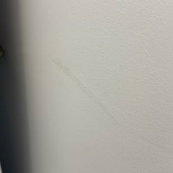 AJ Madison Home & Kitchen Appliances Showroom - Just painted wall scratched up
