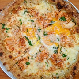 House Kimchi, Mozzarella, Eggs Pizza | Instagram: @telephonesmoothie House Kimchi, Mozzarella, Eggs Pizza | Instagram: @telephonesmoothie