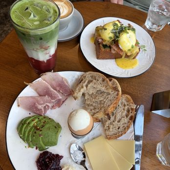 The Bakero - The Bakero plate (with ham), Eggs Benedict with bacon, iced strawberry matcha latte and cappuccino - Bakeries Near Me - Sarasota, Florida The Bakero - The Bakero plate (with ham), Eggs Benedict with bacon, iced strawberry matcha latte and cappuccino - Bakeries Near Me - Sarasota, Florida