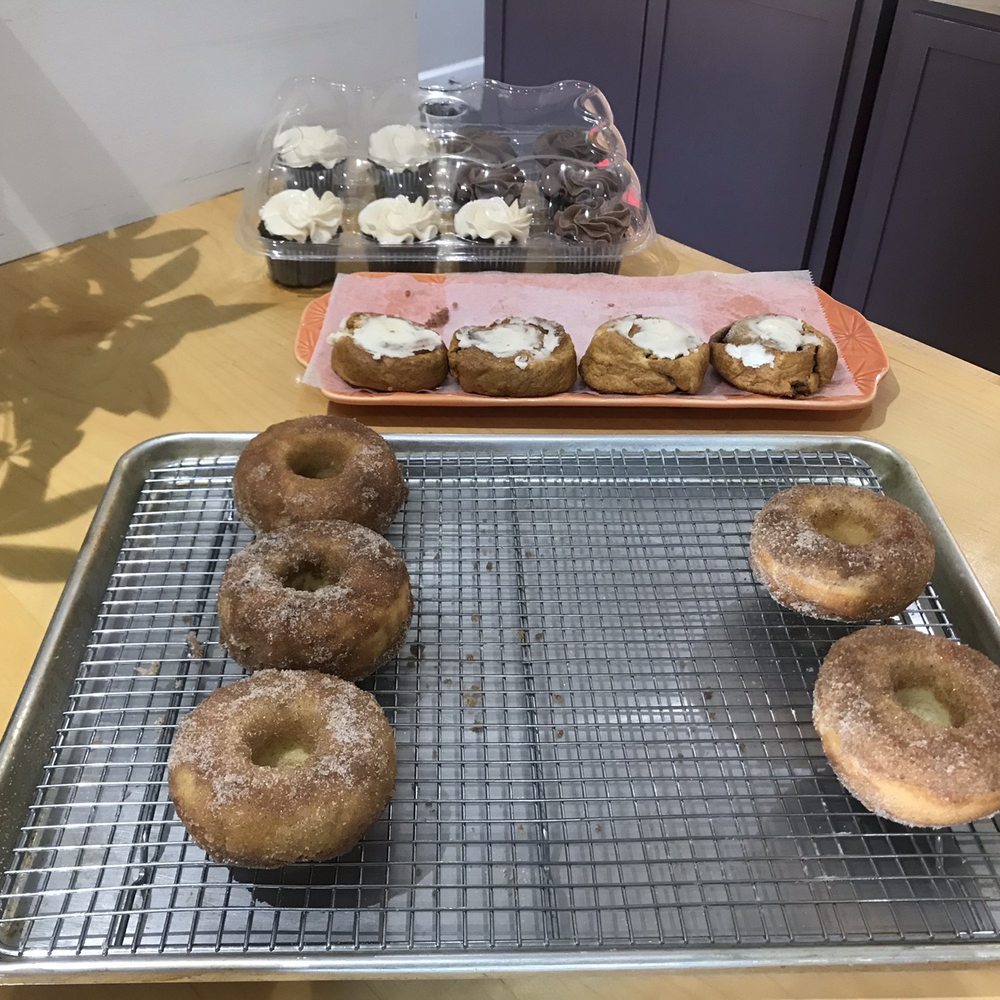 Isaura Bakery - Apple cider donuts and cinnamon rolls. Far back are chocolate cupcakes - Bakeries Near Me - Hawthorne, New Jersey