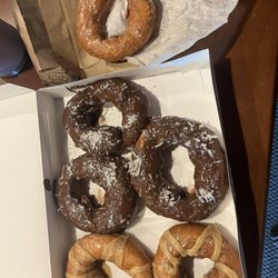 Miss Miller’s Donuts - Maple, chocolate coconut and a classic glaze.