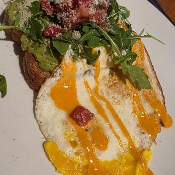 Burt & Max's - Avocado Toast with Sriracha sauce on the eggs - Bars Near Me - Delray Beach, Florida Burt & Max's - Avocado Toast with Sriracha sauce on the eggs - Bars Near Me - Delray Beach, Florida