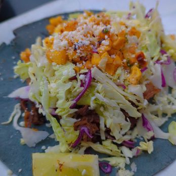 Off The Hook - Short rib beef taco. The beef beef is very moist and seasoned. Well, with a beautiful corn tortilla  -  - also on the happy hour menu - Seafood Near Me - Los Alamitos, California