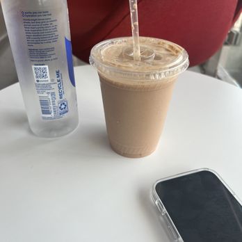 Simply Puur - a drink and a cell phone on a table - Salad Near Me - Indianapolis, Indiana Simply Puur - a drink and a cell phone on a table - Salad Near Me - Indianapolis, Indiana