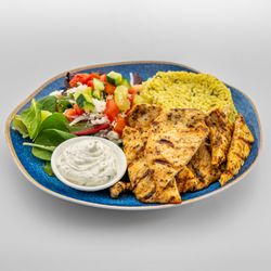 Pita Grill BK - Chicken breast rice bowl, can't beat the flavor and the delicious protein the mesclun salad and the warm puffy lemon rice ,come try it.