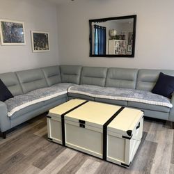 Rooms To Go - Crème coffee table which was ordered white.