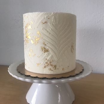 Heirloom Baking - a cake on a cake stand - Bakeries Near Me Heirloom Baking - a cake on a cake stand - Bakeries Near Me